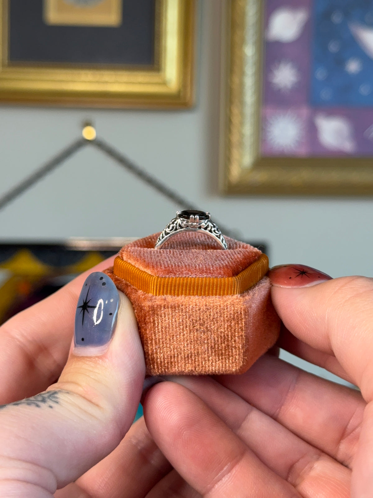 Horizontal garnet filigree ring