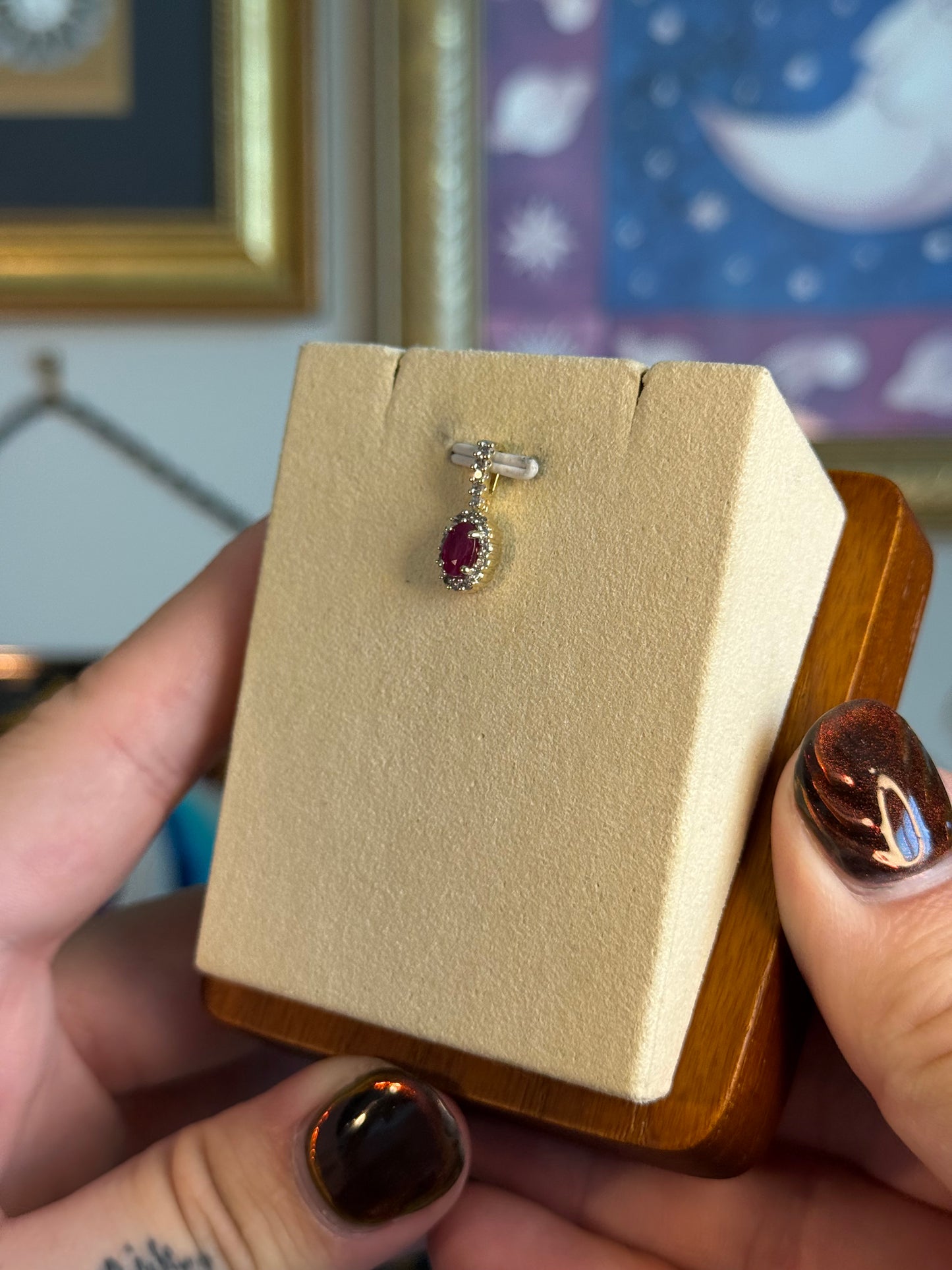 Oval Ruby and diamond pendant