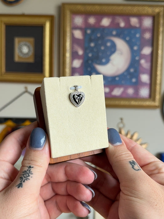 Black onyx & diamond floral motif pendant