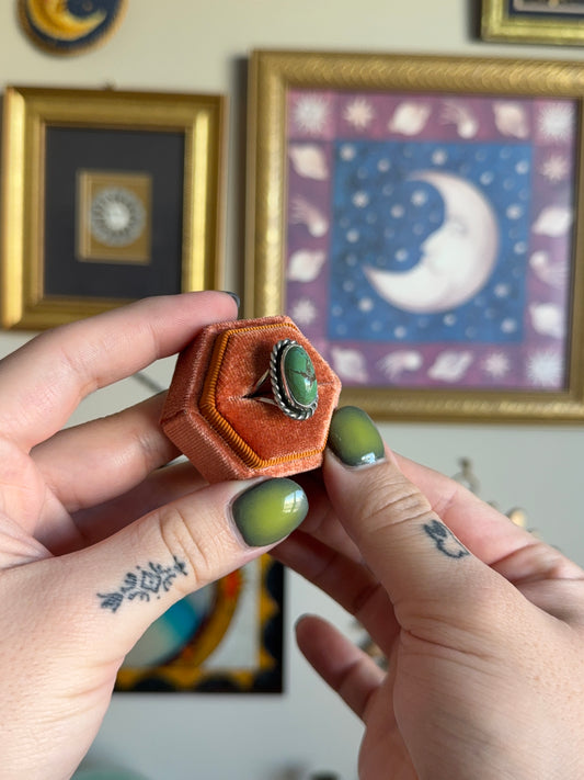 Green turquoise ring with twisted bezel