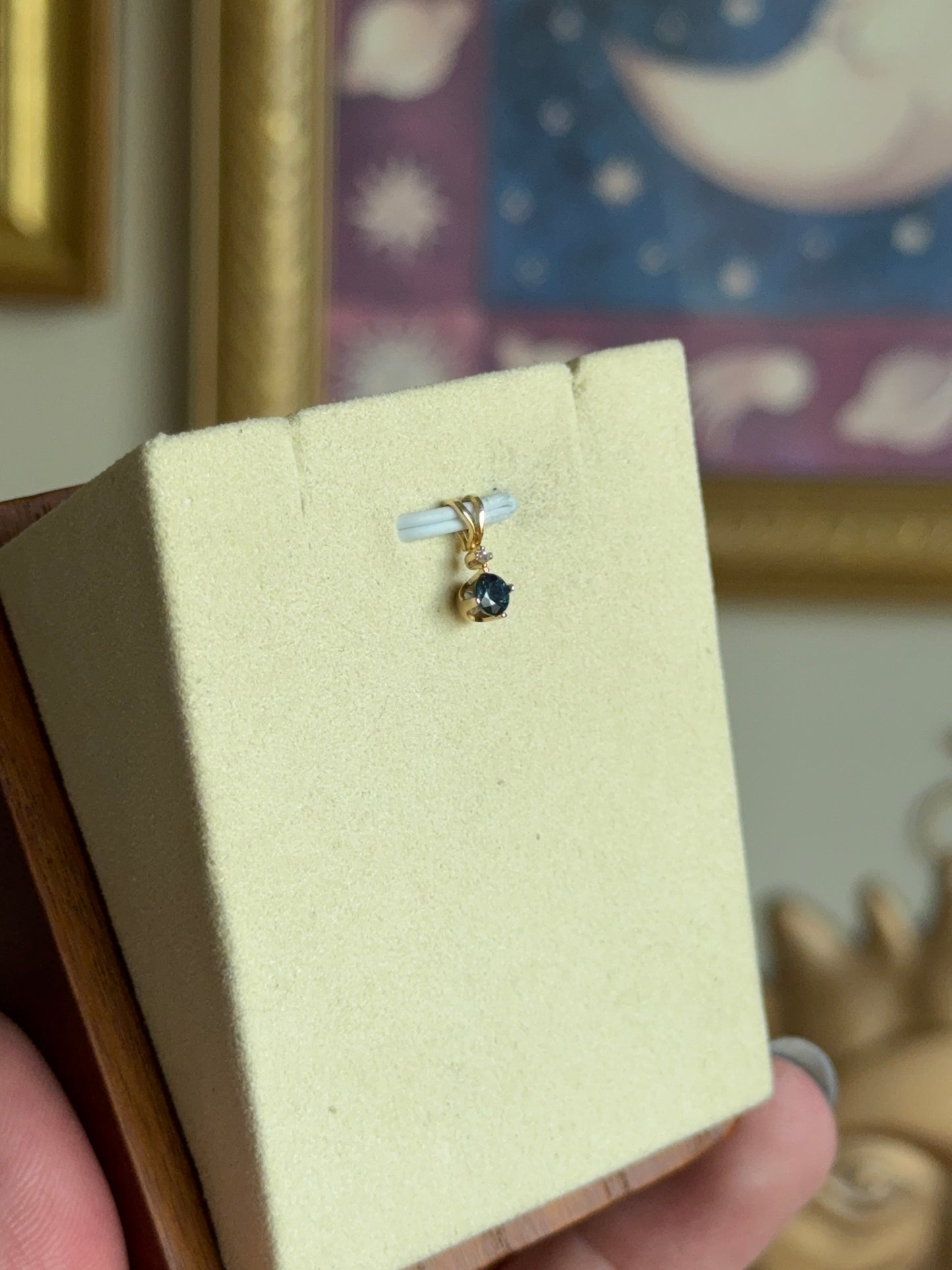 Round blue topaz pendant