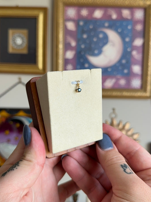 Round blue topaz pendant