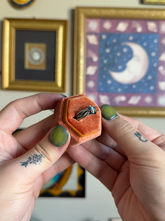 Twisted abstract turquoise ring