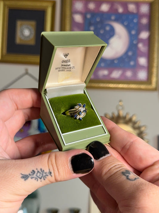 Gold sapphire and diamond cluster