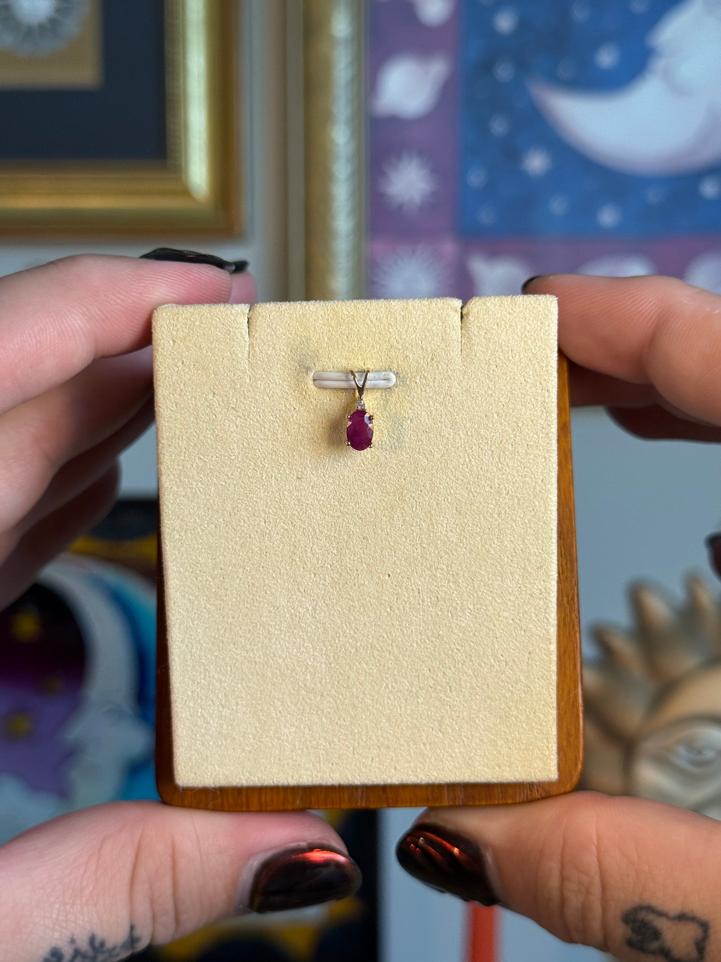 Small oval ruby pendant