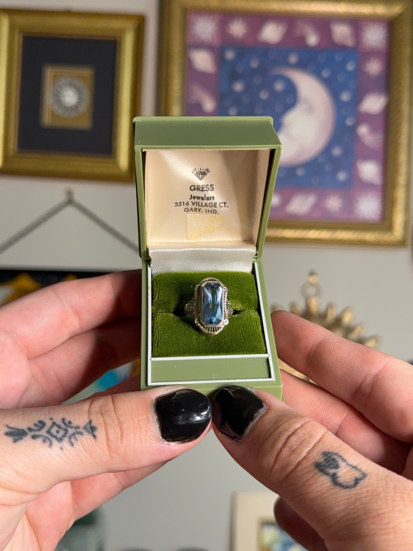 White gold filigree blue topaz