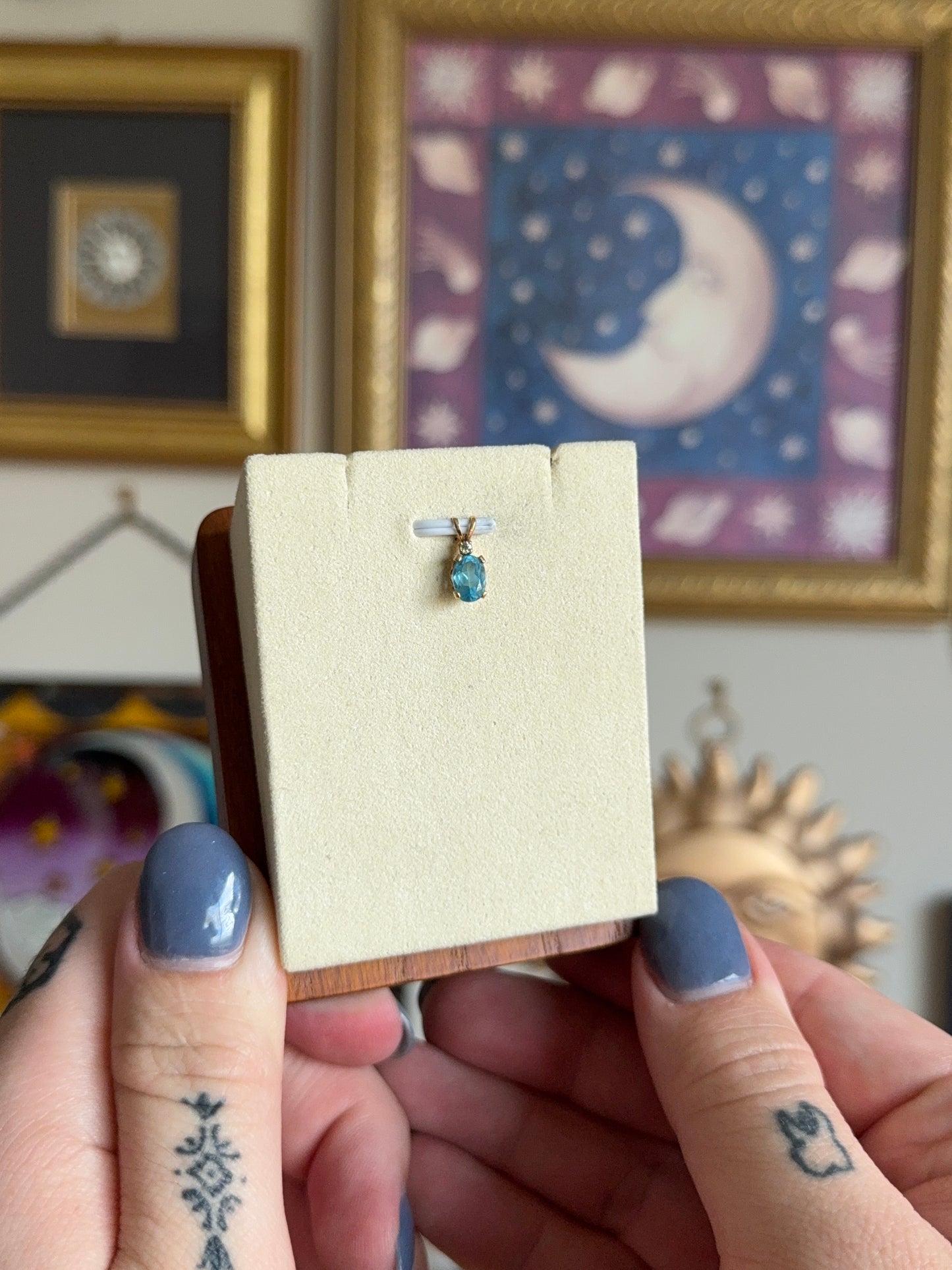 Oval blue topaz pendant