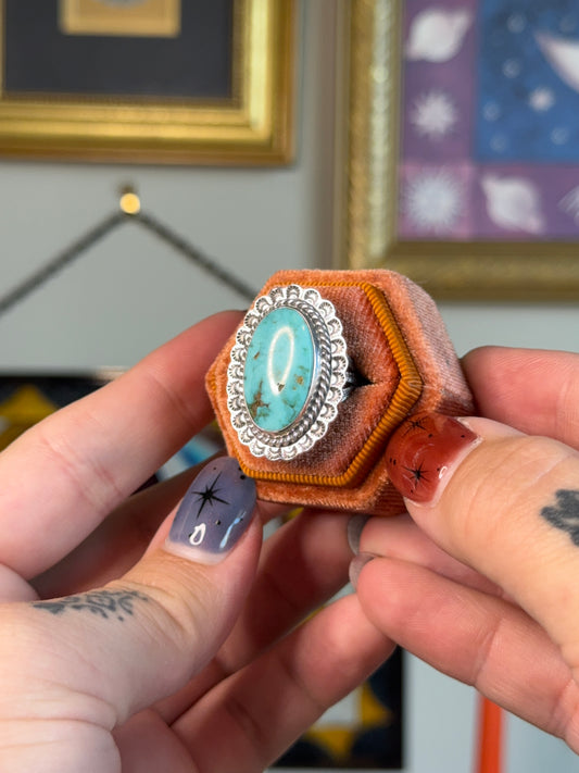 Large oval turquoise ring with scalloped edges