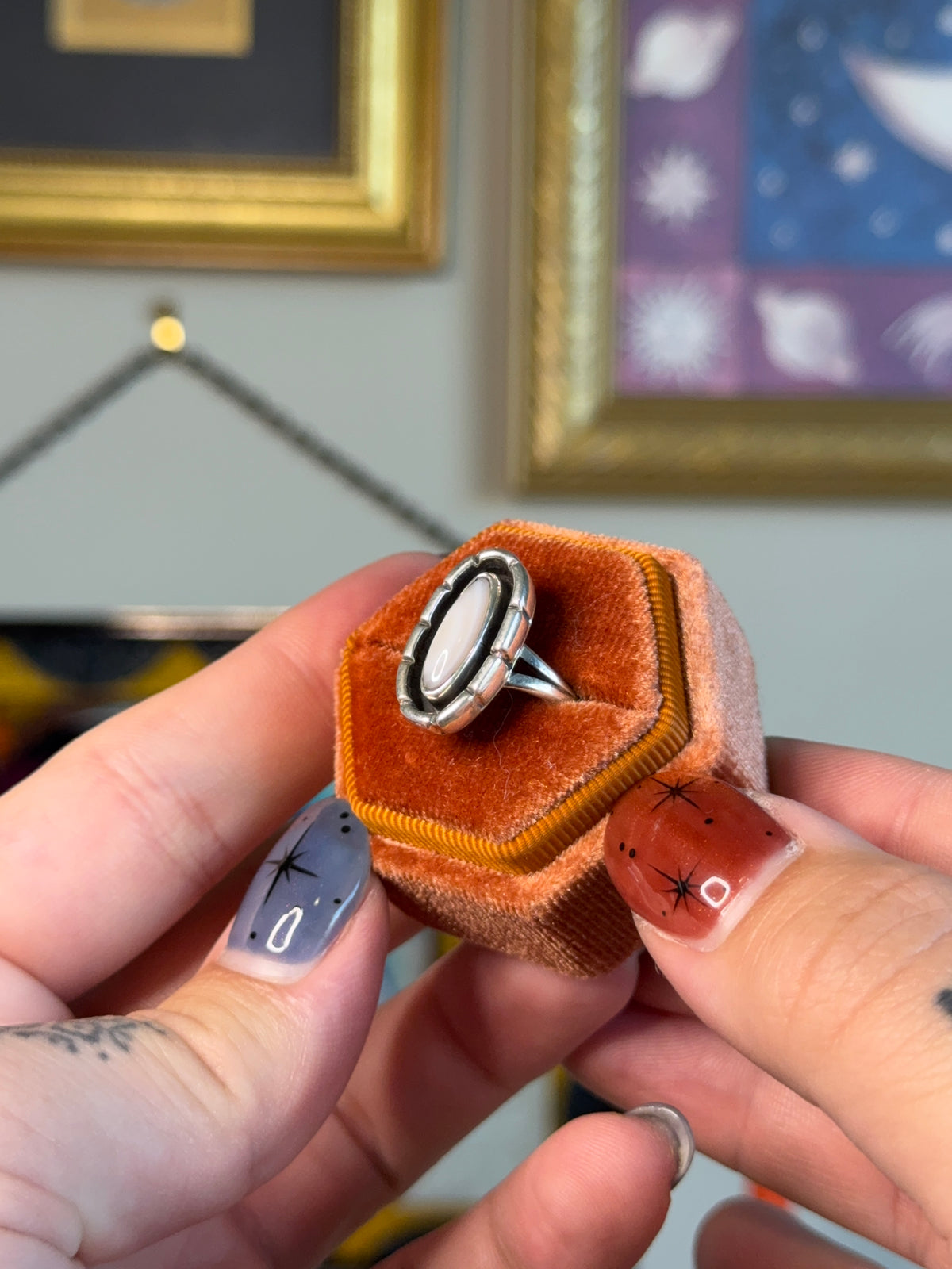 Small elongated mother of pearl ring