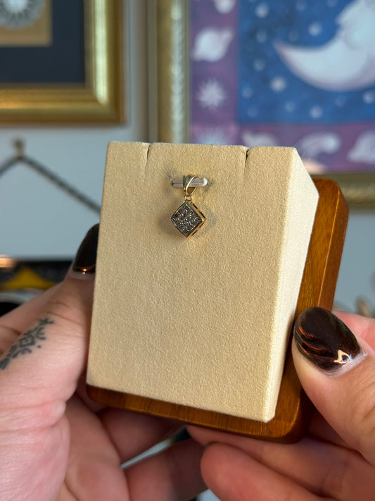 Diamond shaped diamond cluster pendant