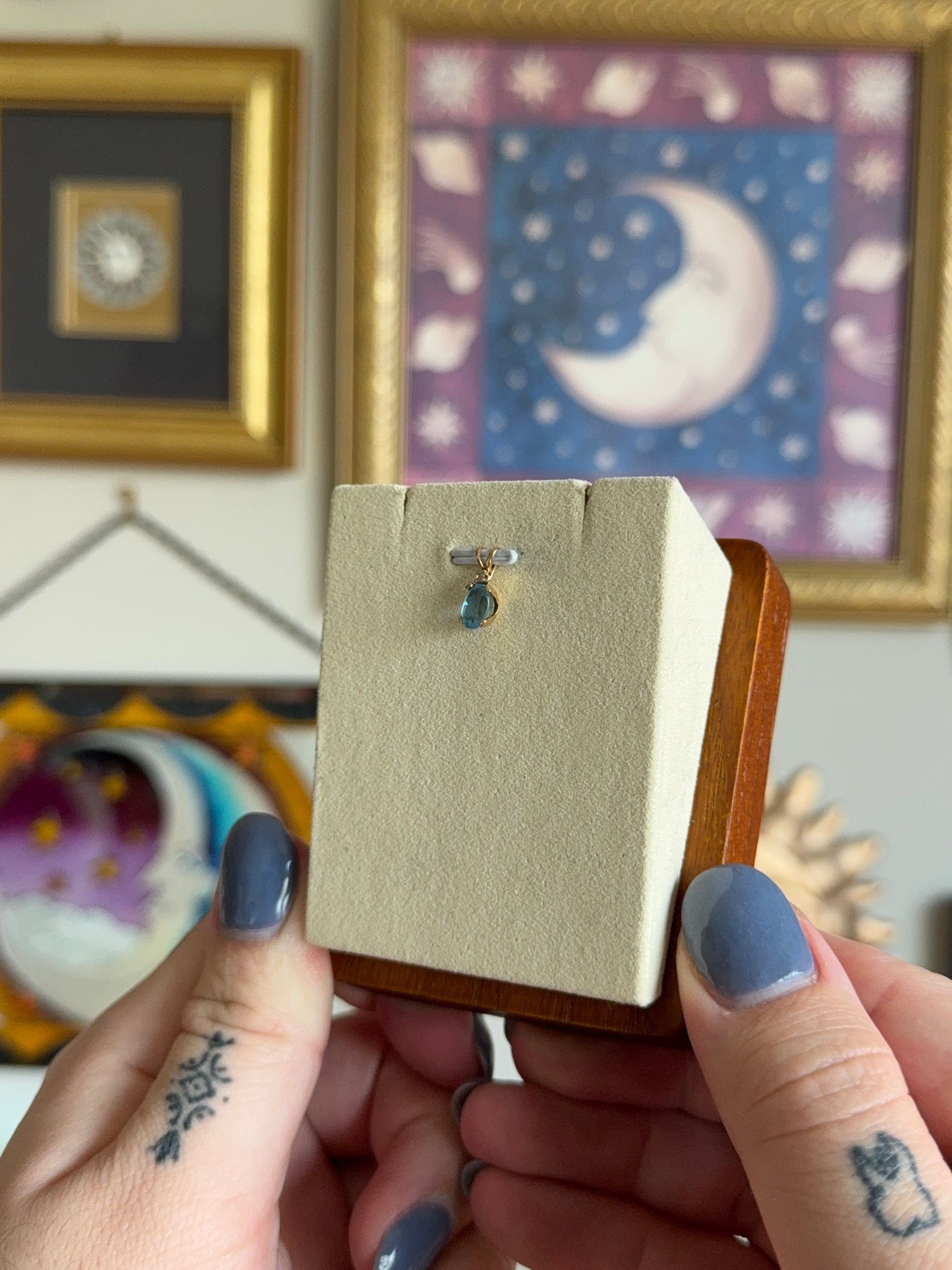 Oval blue topaz pendant