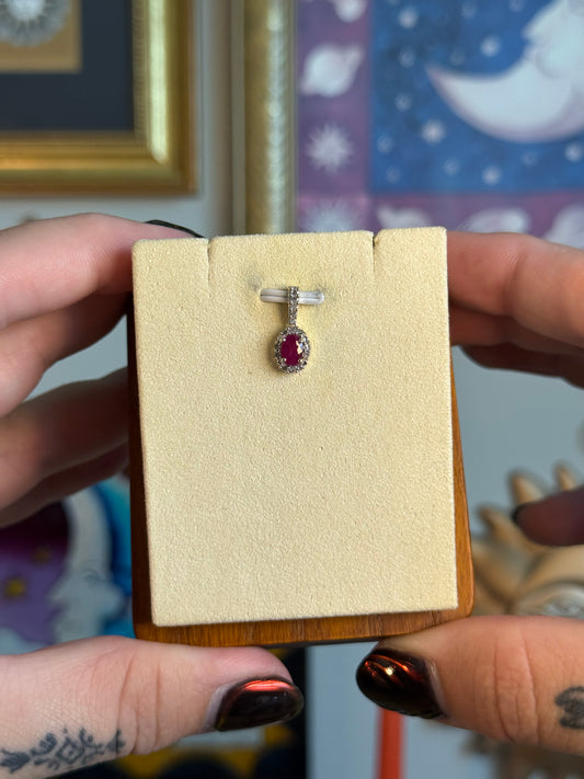 Oval Ruby and diamond pendant