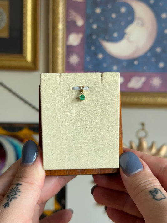Round emerald pendant