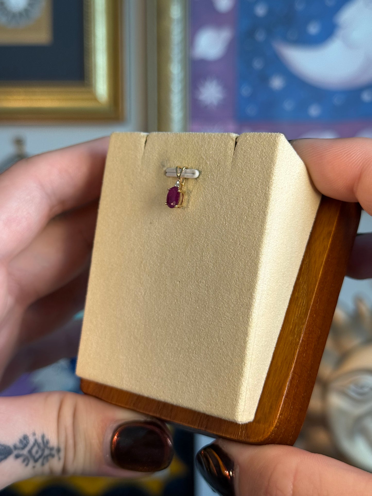 Small oval ruby pendant