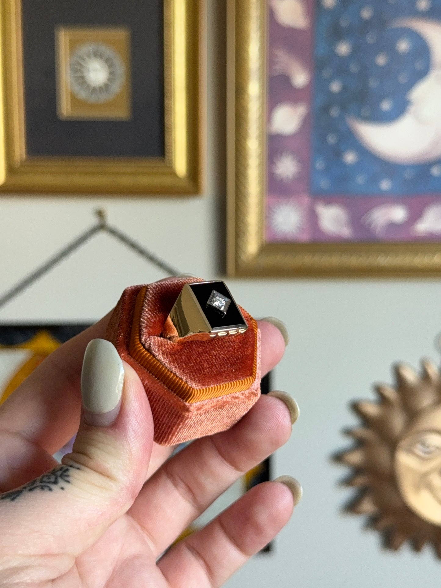 Gold rectangular black onyx signet with diamond motif