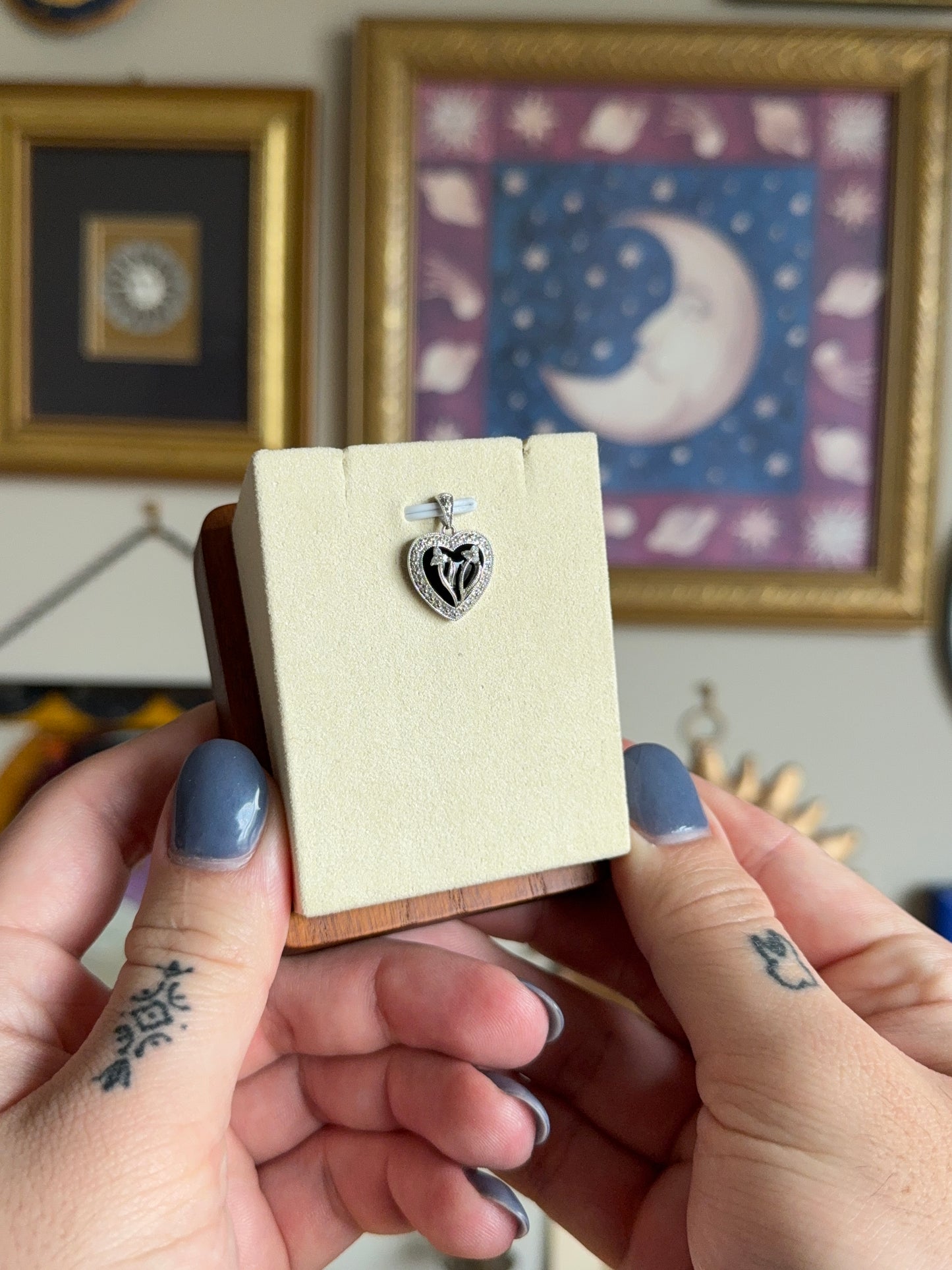 Black onyx & diamond floral motif pendant
