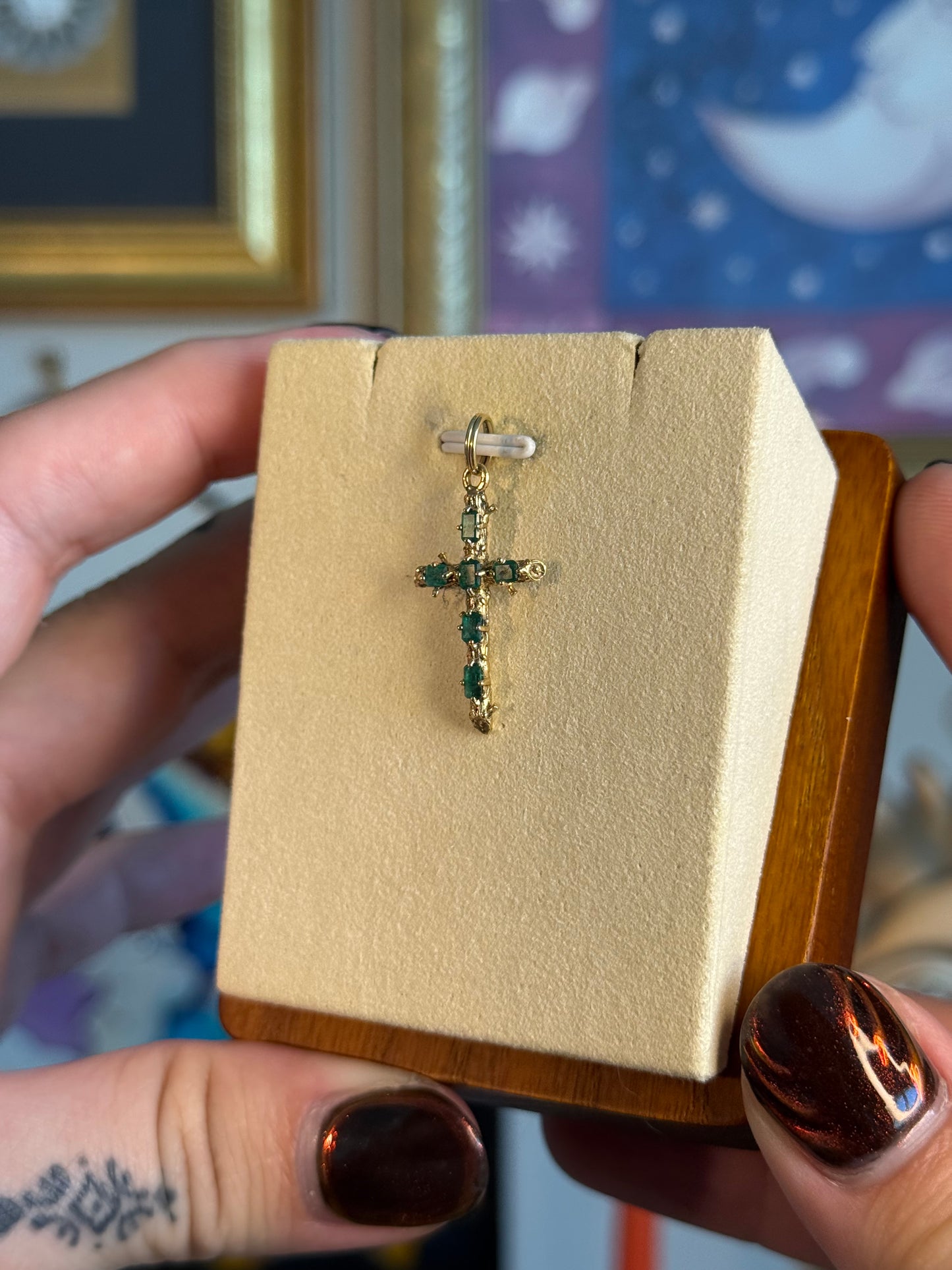 Gold emerald cross pendant
