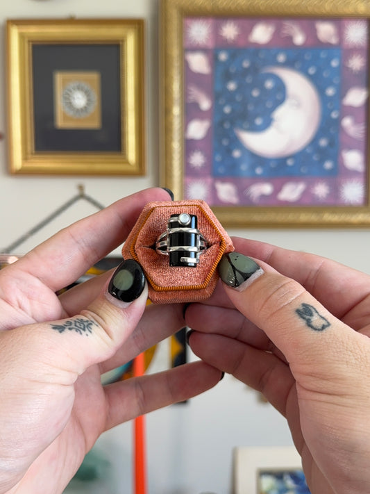 Elongated black onyx & mother of pearl ring