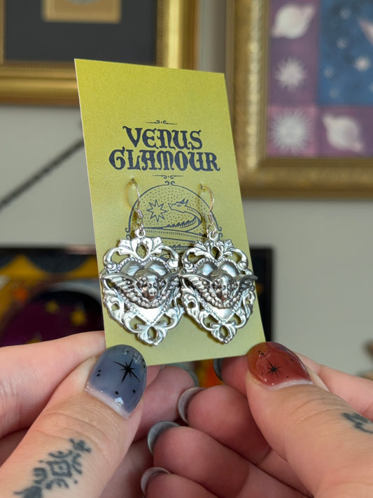 Cherub shield earrings