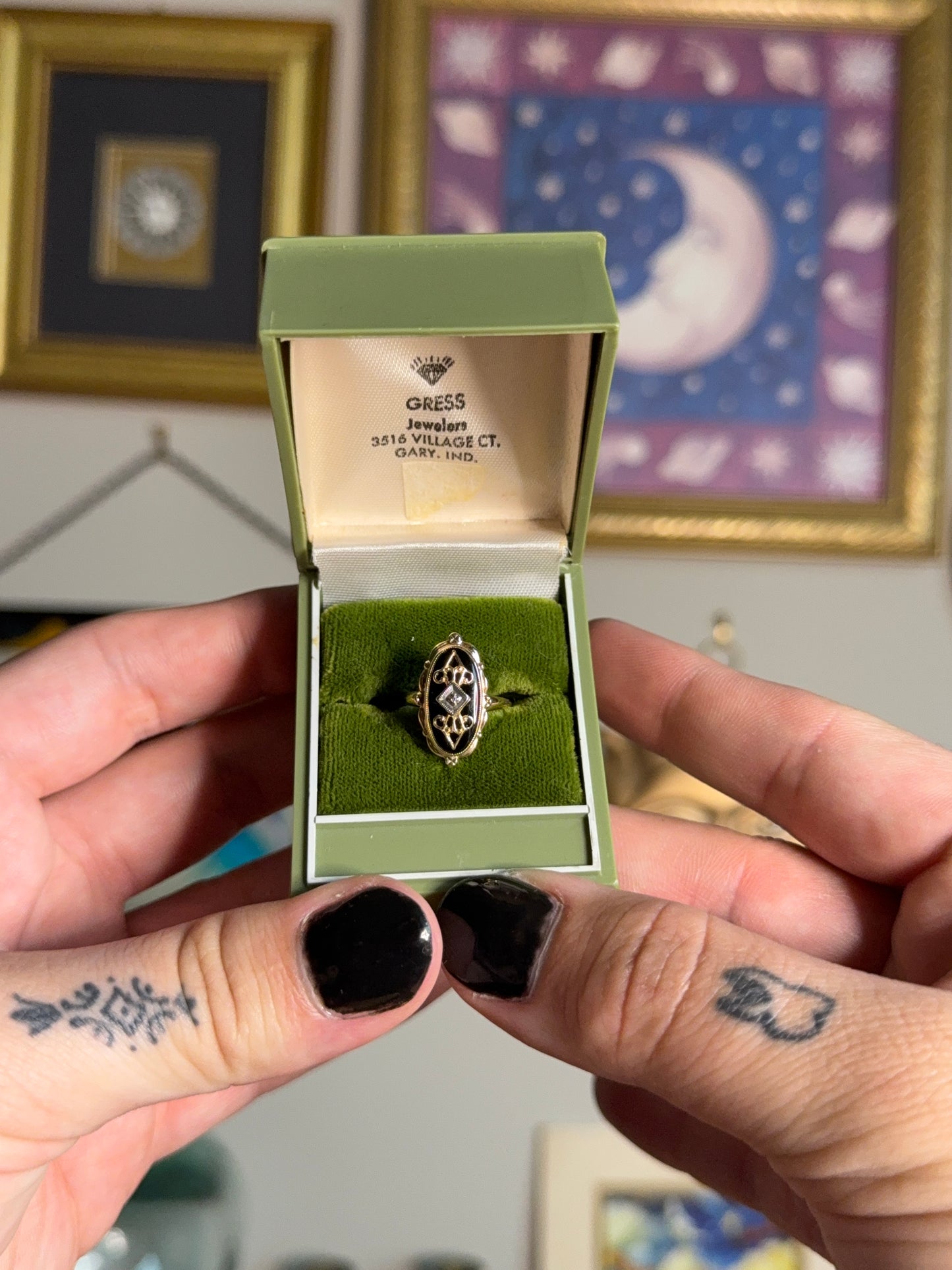 Ornate filigree gold black onyx