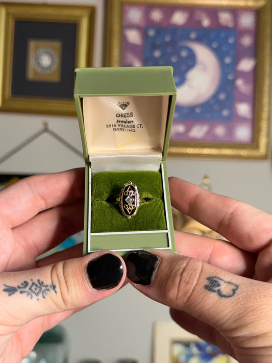 Ornate filigree gold black onyx