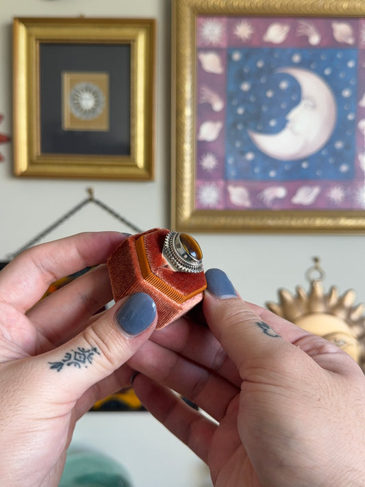 Oval cabochon tigers eye ring