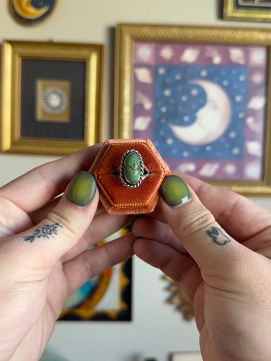 Green turquoise ring with twisted bezel