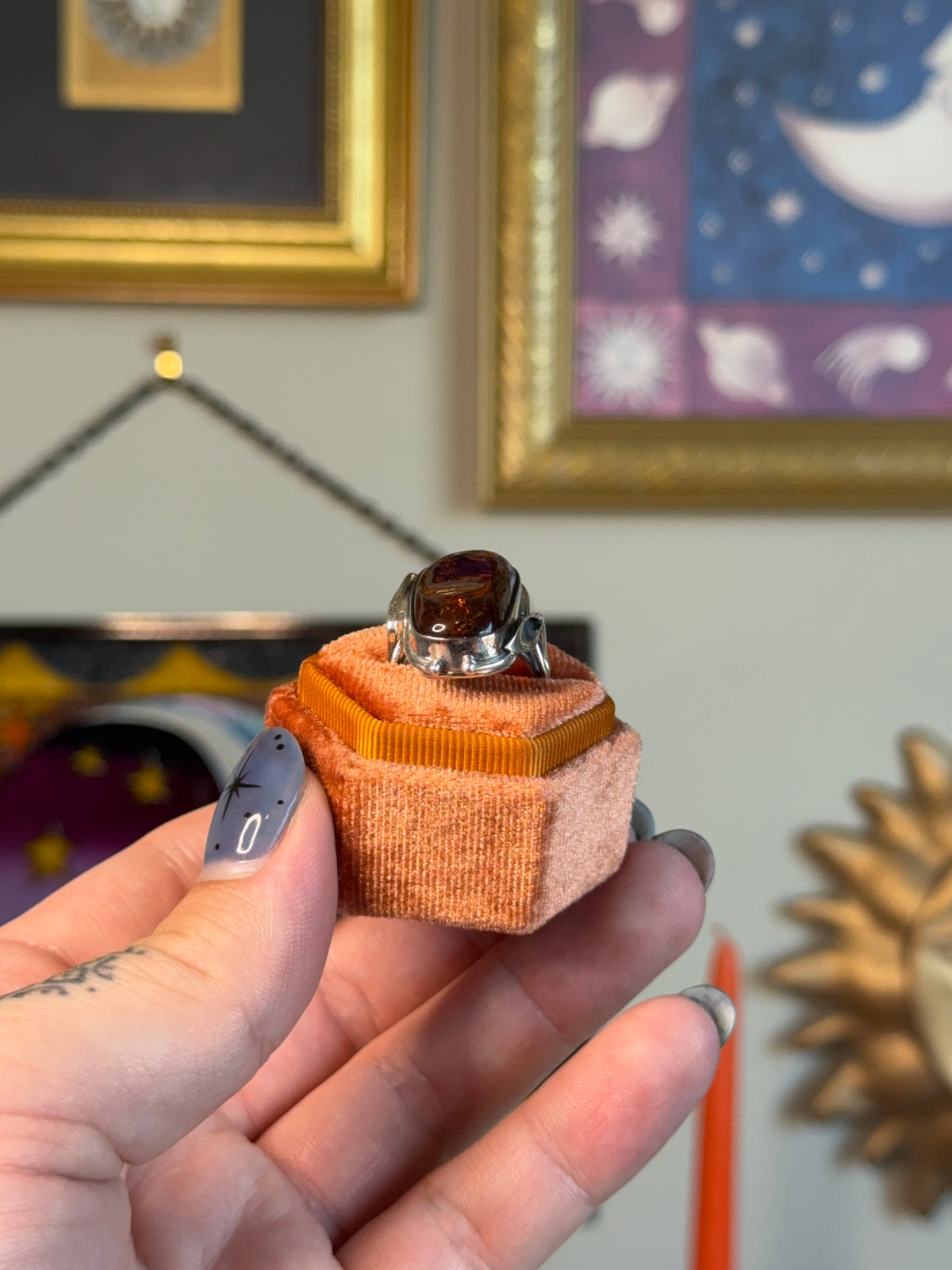 Modernist amber ring with floral detail