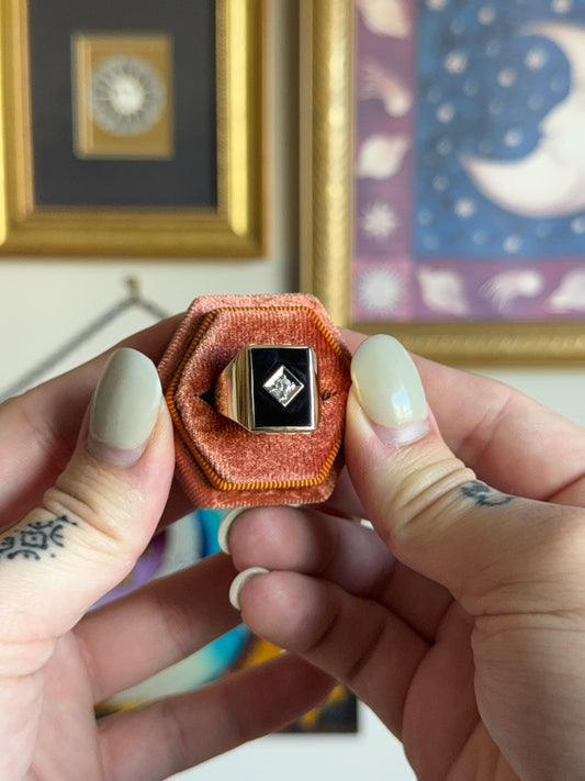 Gold rectangular black onyx signet with diamond motif