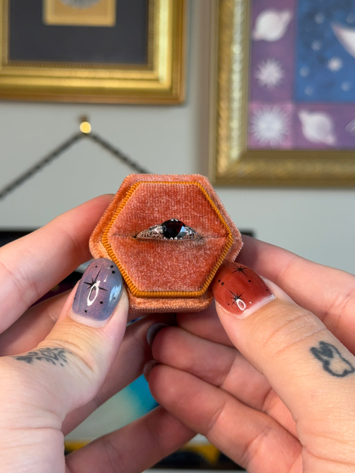 Horizontal garnet filigree ring