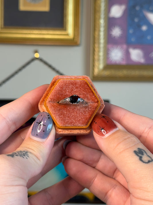 Horizontal garnet filigree ring