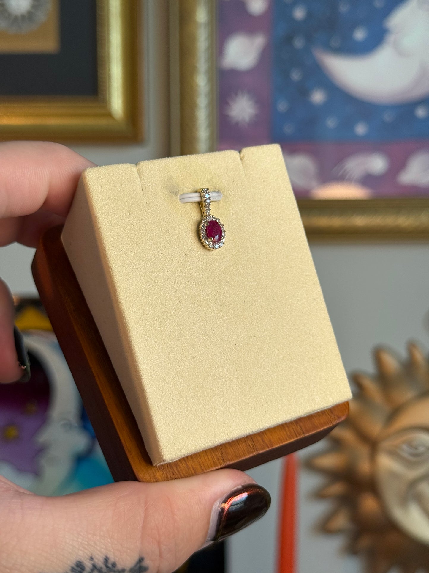 Oval Ruby and diamond pendant