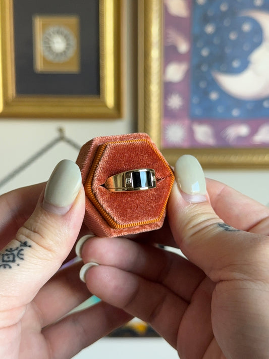 Gold Black onyx faceted signet paired with diamonds
