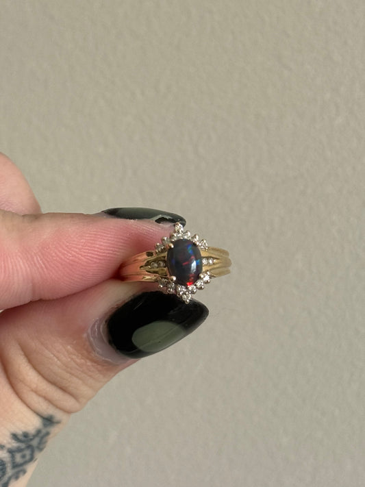 Yellow gold black opal cluster