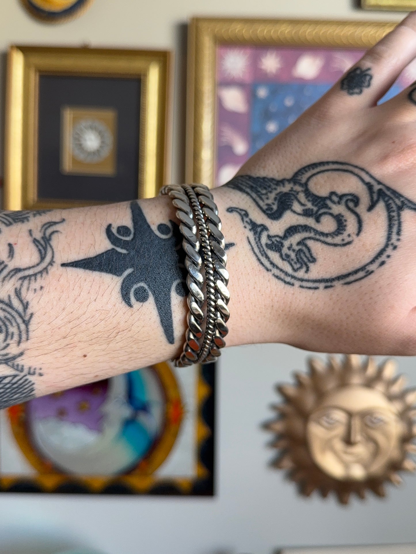 Twisted chain cuff