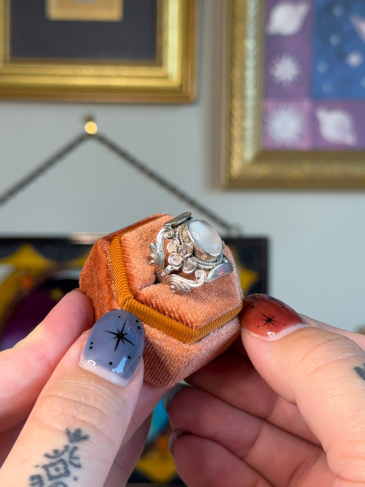 Detailed floral moonstone ring