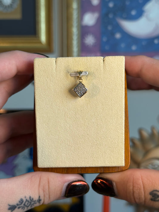 Diamond shaped diamond cluster pendant