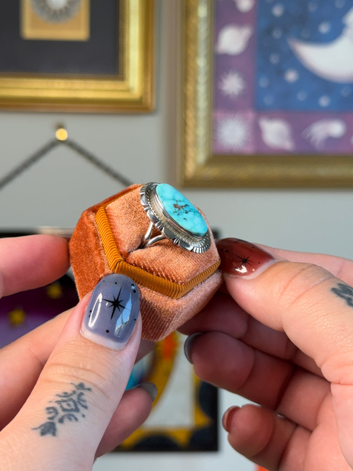 Elongated turquoise ring with detailed bezel