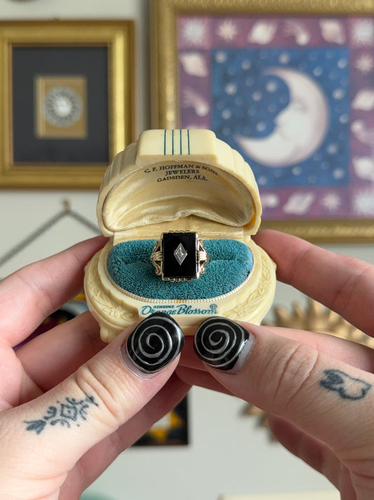 Square Black Onyx ring with diamond motif
