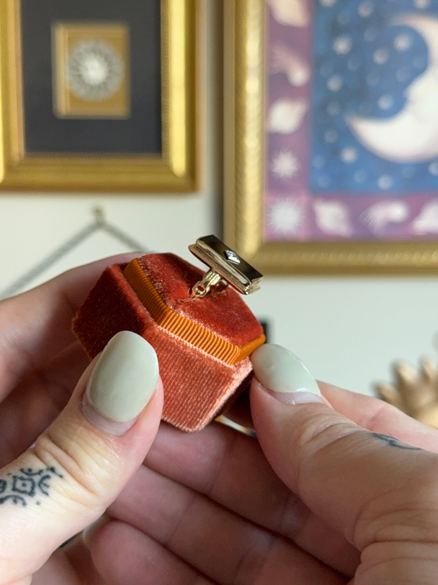 Gold Rectangle black onyx motif ring with detail