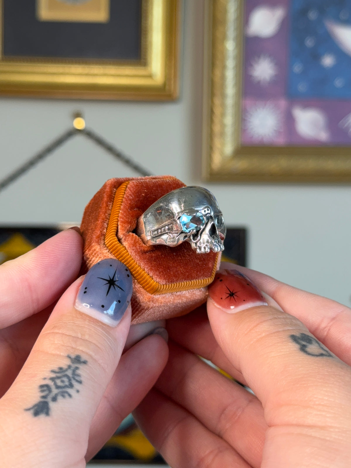 Skull ring with aquamarine stone eye
