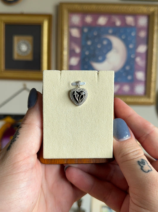 Black onyx & diamond floral motif pendant