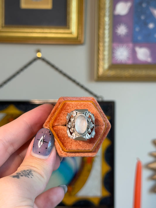 Detailed floral moonstone ring