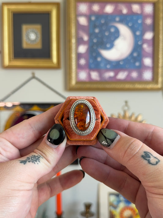 Large oval amber ring