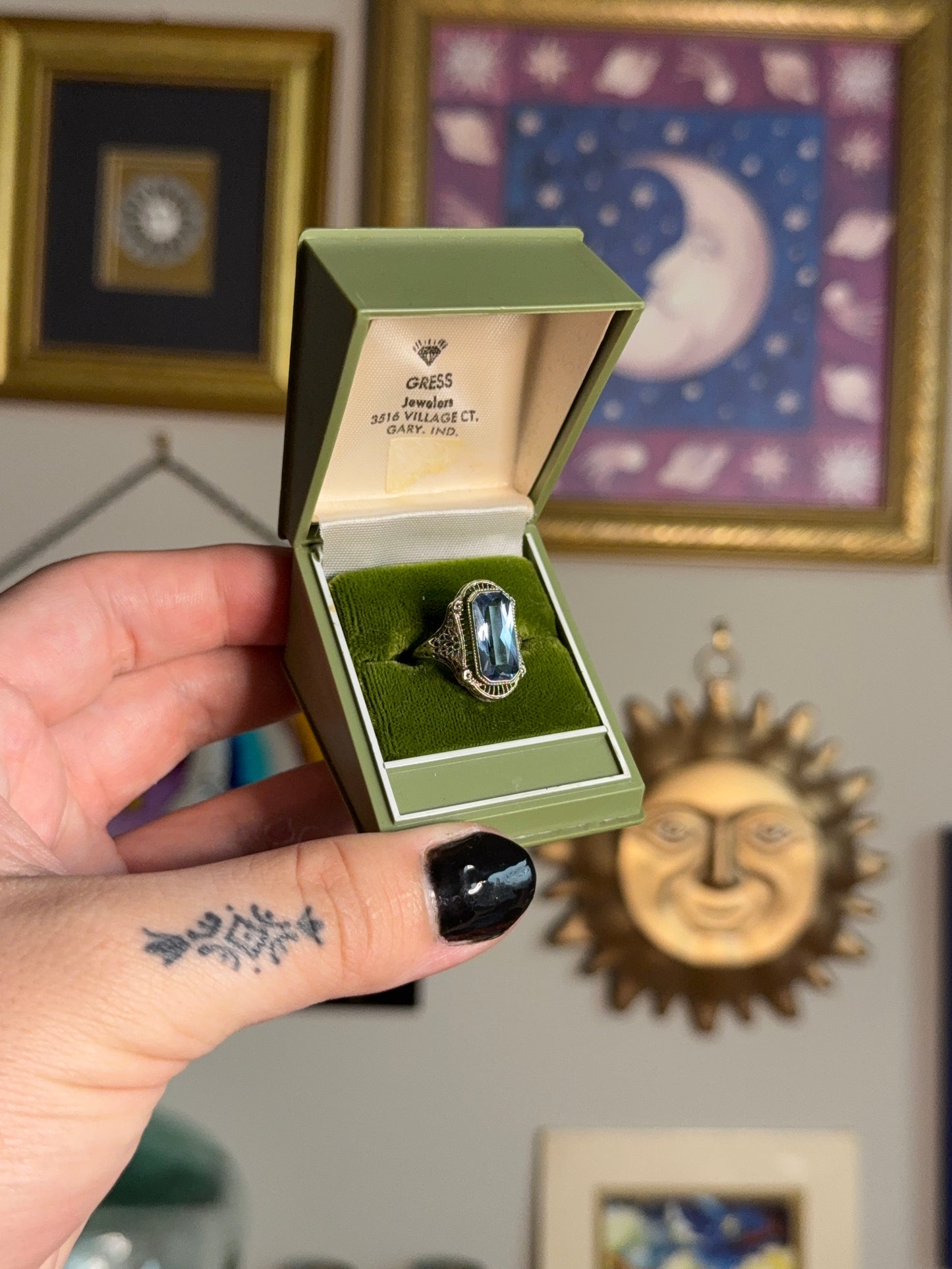 White gold filigree blue topaz