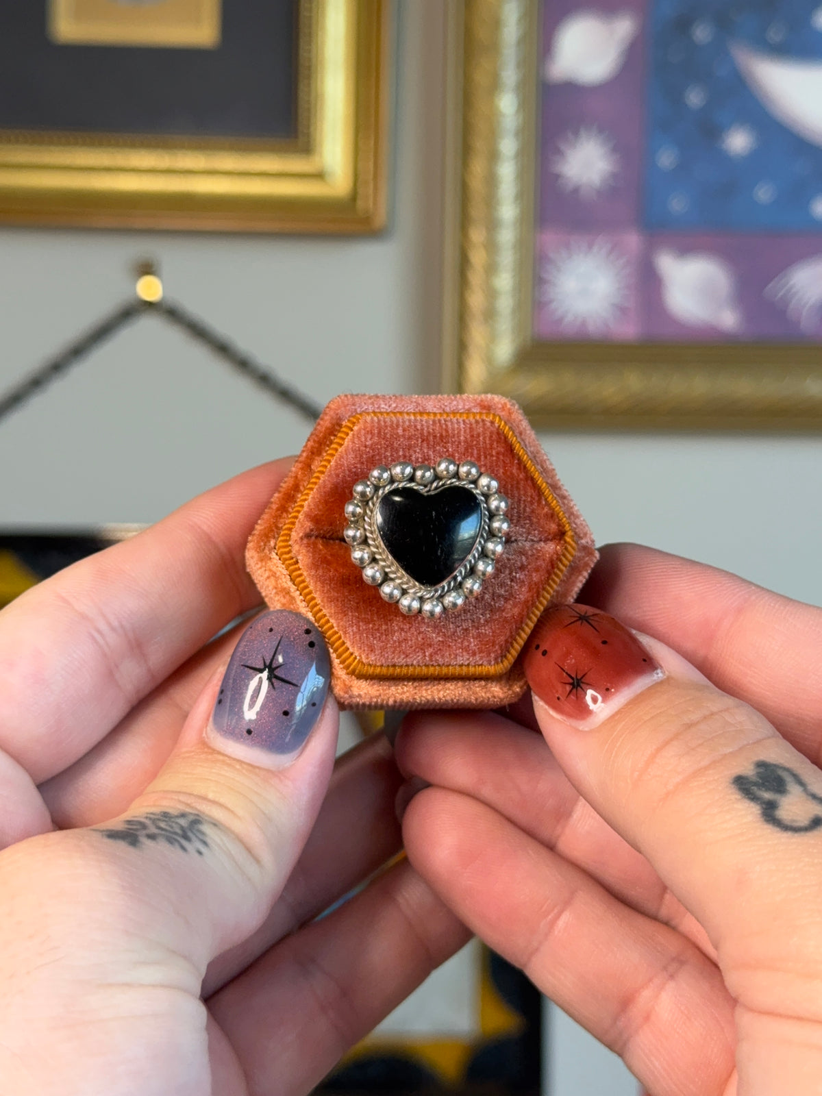 Black onyx heart ring with beaded detail