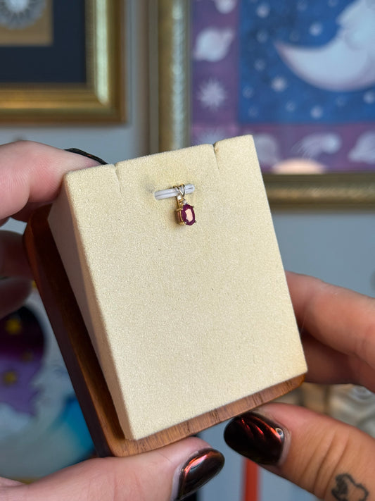 Small oval ruby pendant