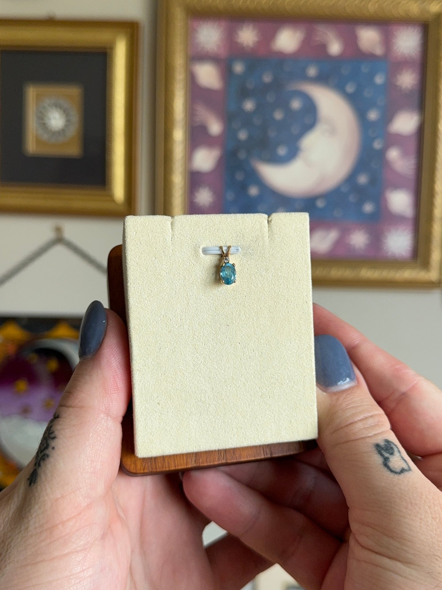 Oval blue topaz pendant