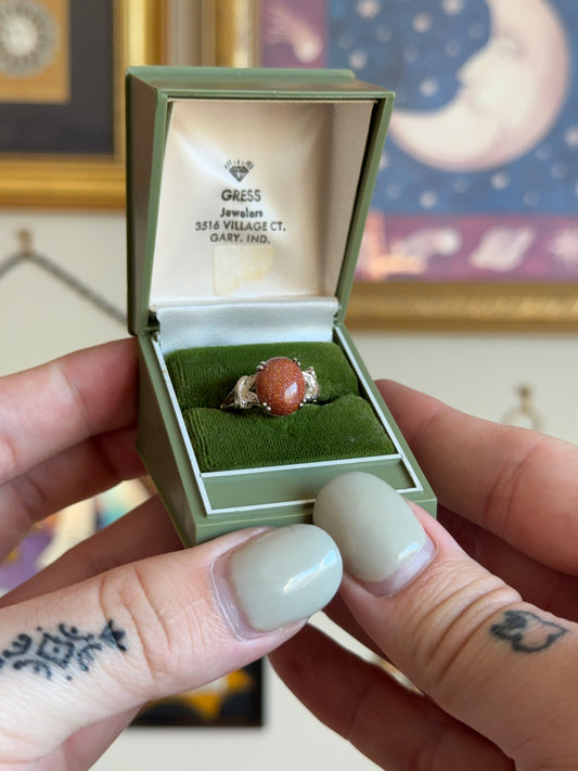 Silver goldstone ring with butterfly detail