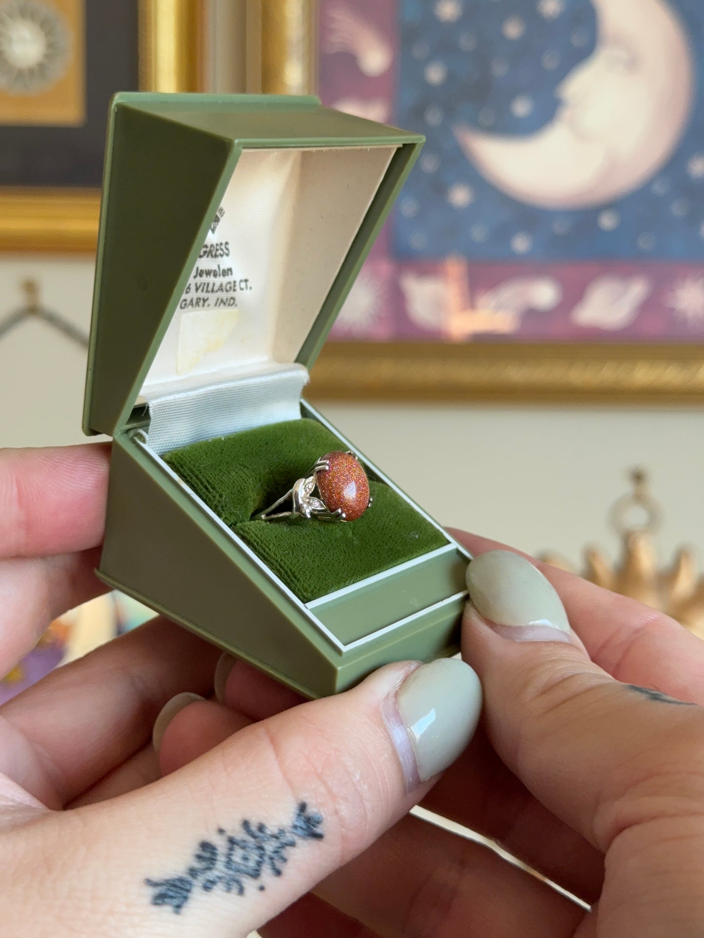 Silver goldstone ring with butterfly detail